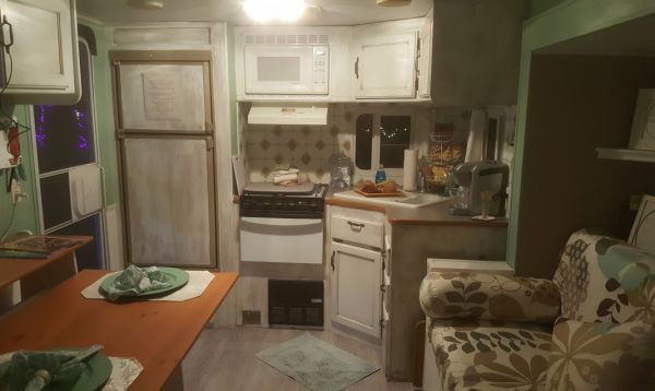 My first look on the night we arrived. Kitchen, dining and living space.